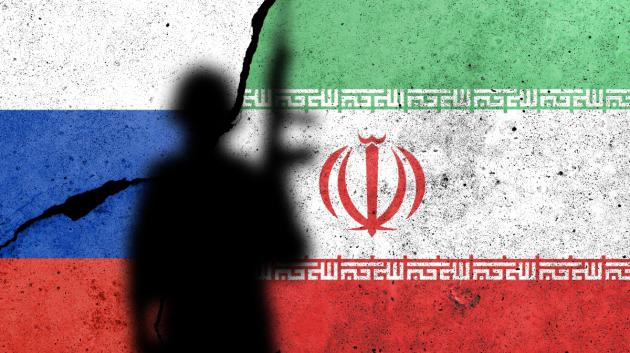 Σιλουέτα μπροστά σε σημαίες